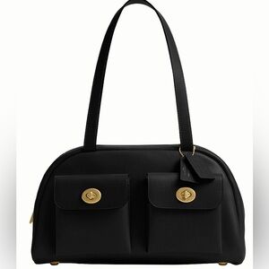 COACH
Twin Turn-Lock Satchel Bag